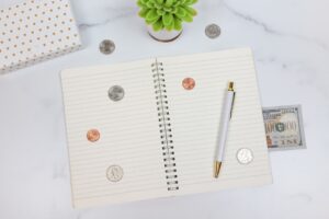 Cash and coins arranged for a study on Bible verses about finances and biblical stewardship